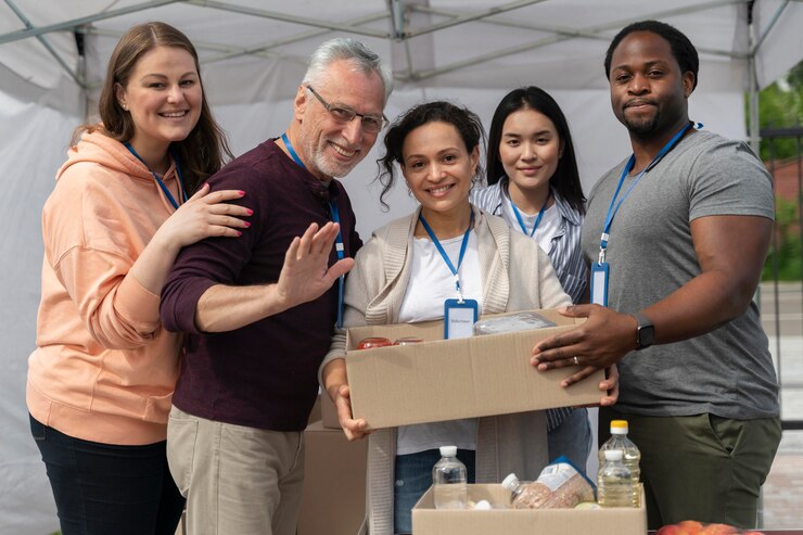 group-people-volunteering-foodbank-poor-people_23-2149012198